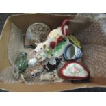 A box containing assorted items including a 19th Century cow creamer, a porcelain patch box,