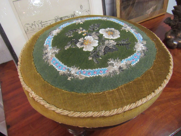 A Victorian walnut circular footstool with floral beadwork upholstery on turned and reeded feet, - Image 2 of 3