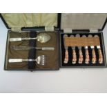 Two cased sets of cutlery