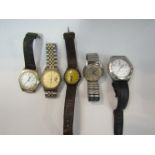 A silver cased wristwatch and four others