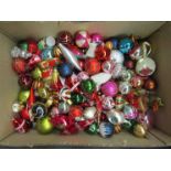 A box containing decorative Christmas baubles some vintage