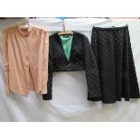 Two items of 1970's clothing including a Louis Feraud black and grey two piece suit with emerald
