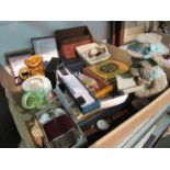 A box containing assorted items including wristwatches, desk rack, jewellery box etc.