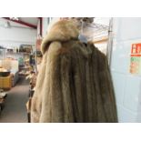 Two fur coats including M.