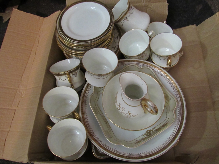 An assortment of white ground and gilt design table wares to include Fenton swag design china with