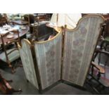 A 19th Century French gilt three panel graduated folding modesty screen,