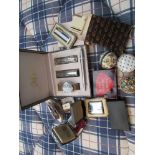 A tin box containing Ronson lighters,