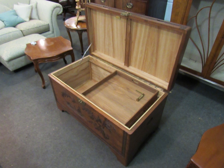 A mid 20th Century Southeast Asia camphor wood trunk with carved decoration and sliding tray (with - Image 3 of 3