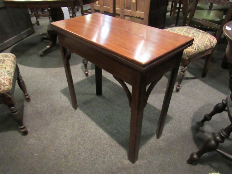 A mahogany tea table with arched supports, - Image 2 of 2