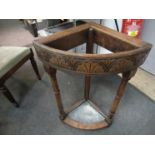 A Victorian oak corner stick stand,