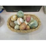 A basket containing assorted onyx items,