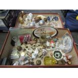 A suitcase containing assorted china figures and metal wares etc.