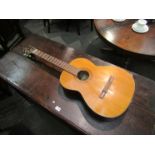 A Kimbara classical acoustic guitar