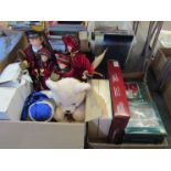 Two boxes of Christmas decorations including figures,