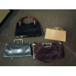 Four 1970's classic fashion handbags in iconic shapes including leather and suede,