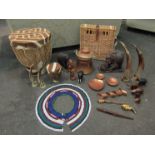 A quantity of African items including a skin drum, two large carved elephants, carved horn figures,