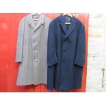 A navy wool mid - 20th Century herringbone heavy overcoat and a 1960's brown herringbone single