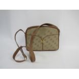 A Fortnum & Mason canvas and leather shoulder bag with FM motifs