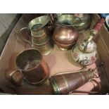 A box of copper jugs,
