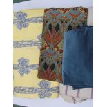 A pair of interlined glazed cotton blue and yellow curtains with bow design,
