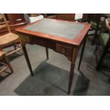 A French fruit wood 19th Century writing desk of two drawers on square tapering brass cap footed