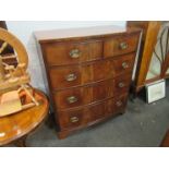 A circa 1840 flame mahogany bow front chest of two short over three drawers,