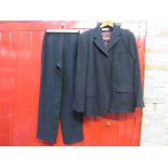 A Nicole Farhi navy jacket and a pair of Giorgio Armani navy trousers,