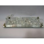 A glass tray containing assorted glass animals including a Waterford crystal elephant and various