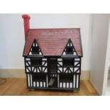 A hand built Tudor style dolls house, approx.