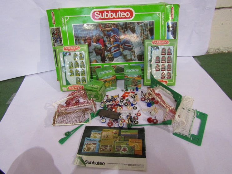 Two boxed Subbuteo teams; Norwich City and Standard de Liege together mixed accessories,
