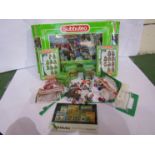 Two boxed Subbuteo teams; Norwich City and Standard de Liege together mixed accessories,