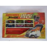 A boxed Matchbox Superfast G-6 Drag Race set containing six diecast cars and Thunderbolt Launcher,