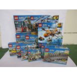 Twelve unopened Lego City sets; 60137, 60193, 7499, 60221, 60084, 60077, 60171, 60150, 60169 (x2),