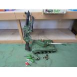 A Topper Toys plastic remote controlled tank with accessories,