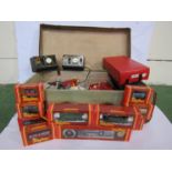 A collection of Hornby '00' gauge railway items including three boxed locomotives,