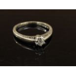 A 9ct white gold solitaire diamond ring .15ct diamond. Size M, 2.