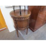 A late 19th Century French circular cabinet with single drawer