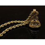 A gold rope twist necklace stamped 10k, 50cm long, 9.8g hung with a 9ct gold ornate citrine fob, 9.