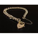 A gold bracelet stamped 9c, with a 9ct gold padlock clasp,