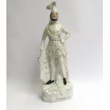 A large Victorian Staffordshire "Crusader" figure, cracks to neck,