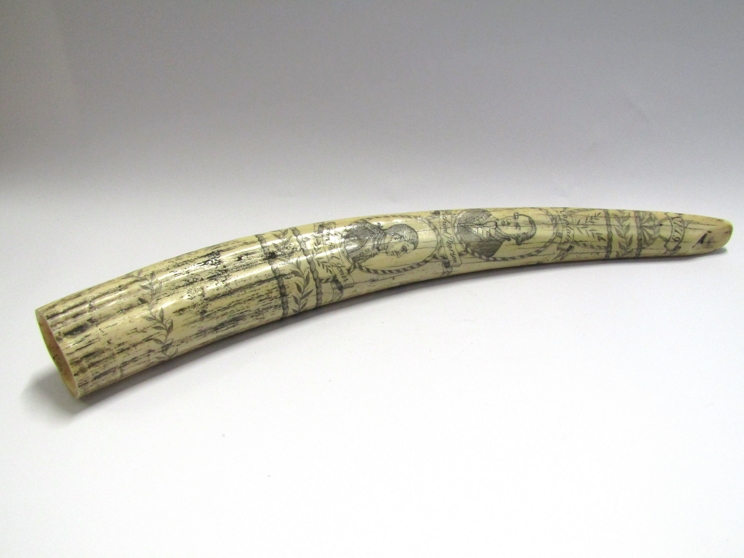 A resin tusk imitating a piece of Georgian scrimshaw,