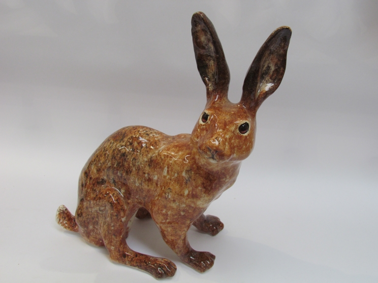 A Winstanley brown seated hare,