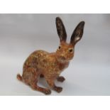 A Winstanley brown seated hare,