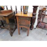 An Arts & Crafts oak pot cupboard, 71cm x 40cm x 32.