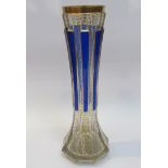 A Bohemian glass vase by Moser, circa 1900, with Vermicelli gilding and royal blue panels,