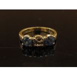 A yellow gold sapphire and diamond ring, unmarked. Size K, 3.