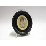 A 19th Century miniature portrait of aristocratic female, wearing white silk dress, oval frame,
