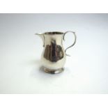 A George II silver cream jug IR or PR,