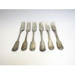 Six Georgian silver forks with crested handles.