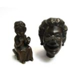 A cast bronze figure small child and bust of female approx 7.